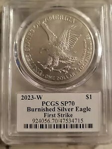 2023-W バーニッシュ シルバー イーグル PCGS SP70 ファースト ストライク ダムストラ - いくつかの小さなスポット