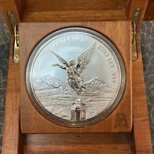 2003 証明っぽい。リベルタード1キロプラタプラ。日付を見つけるのが難しい。 .999 シルバー