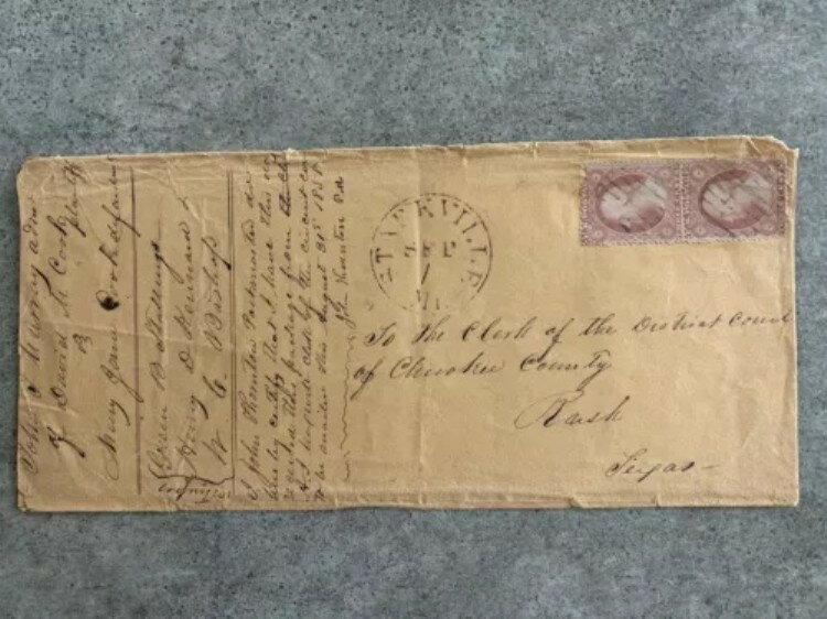 1858年、テキサス州チェロキー郡宛ての切手付き封筒。郵便局長ジョン・ソーントン署名。