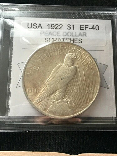 1922 USA, Silver Peace Dollar..Scratches..商品について流通/非流通 流通額面 1ドルコイン ピース材質 銀発行年 1922年打刻タイプ ビジネス純度 0.9鋳造所 フィラデルフィアグレード XF 40製造国/地域 アメリカ合衆国認定 コインマート注意事項※以下の注意事項をご理解のうえ、ご購入ください■ 鑑定済みコイン・紙幣について各種コイン・紙幣の鑑定機関（NGC、PCGS、PMGなど）は、収集品の真贋鑑定およびグレーディングを行う専門機関です。鑑定後の商品は、専用ケース（スラブ）に封入され、状態を示すグレードが付与されます。■ グレードについてグレードはコイン・紙幣自体の状態を評価するものであり、ケース自体の品質や状態を保証するものではありません。製造・輸送時の影響により、以下のような状態が発生する場合がございます。- 軽微なスレ傷・拭き傷（特に光の角度で見えるもの）- ケース内部のホコリ・小さな異物（鑑定機関の検品基準を満たしている場合）- ラベルのズレ・わずかな傾きこれらは鑑定機関の基準内であり、返品・交換の対象とはなりませんのでご了承ください。■ ラベルの種類について各鑑定機関では、コイン・紙幣の状態や鑑定の結果に応じて異なるラベルが付与されます。- 通常ラベル（Standard/Regular）：一般的なグレード付き鑑定済みコイン・紙幣- オーセンティック（Authentic）：グレードなしで真贋のみ保証- 詳細グレード（Details）：クリーニング跡やエッジのダメージがあるが本物と認定- 特別ラベル（Special Label）：記念版や特定のデザインの限定ラベル - 例：NGC「Early Releases」「First Releases」、PCGS「First Strike」 などグレードやラベルの種類は、商品画像および説明文をご確認のうえ、ご購入ください。■ 在庫状況について当店の商品は海外から取り寄せております。ご購入のタイミングによっては在庫切れとなる場合がございます。その際はご連絡のうえ、ご注文をキャンセルさせていただく場合がございますので、あらかじめご了承ください。■ ご注文後のキャンセルについてご注文と同時に商品のお取り寄せを開始するため、お客様都合によるキャンセルは承っておりません。■ 配送についてお届けまでに通常2〜3週間ほどかかります。海外の祝日や天候、税関手続きにより通常より配送が遅れる可能性がございます。■ 保証について商品説明に英語で「保証（warranty）」と記載があっても、日本国内では適用されませんのでご了承ください。 当店では、商品到着後7日以内の初期不良に限り、対応させていただきます。 （返品規約の詳細については、楽天市場内の会社概要欄下部をご参照ください。）■ 商品の色・素材感について撮影環境やモニター設定により、実際の商品と色味や質感が異なる場合がございます。■ 価格変動について希少性の高い商品は市場価格の変動により、追加料金をお願いする場合がございます。追加料金に同意いただけない場合には、ご注文のキャンセルが可能ですので、ご安心ください。■ その他サービスについて海外製品の輸入代行も承っております。ショップに掲載されていない商品でもお探し可能ですので、お気軽にご相談ください。尚、業者販売（業販）や複数購入の場合、割引対応も可能です。ご希望の方はお問い合わせください。