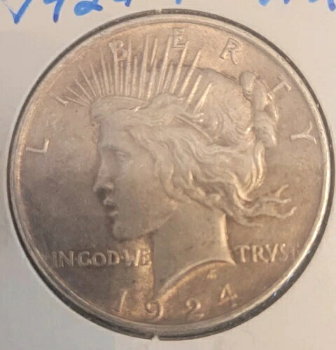 1924 Peace Silver Dollar商品について額面 1ドル流通/非流通 流通コイン ピース材質 銀製造年 1924年製造国/地域 アメリカ合衆国認証 未認証注意事項※以下の注意事項をご理解のうえ、ご購入ください■ 鑑定済みコイン・紙幣について各種コイン・紙幣の鑑定機関（NGC、PCGS、PMGなど）は、収集品の真贋鑑定およびグレーディングを行う専門機関です。鑑定後の商品は、専用ケース（スラブ）に封入され、状態を示すグレードが付与されます。■ グレードについてグレードはコイン・紙幣自体の状態を評価するものであり、ケース自体の品質や状態を保証するものではありません。製造・輸送時の影響により、以下のような状態が発生する場合がございます。- 軽微なスレ傷・拭き傷（特に光の角度で見えるもの）- ケース内部のホコリ・小さな異物（鑑定機関の検品基準を満たしている場合）- ラベルのズレ・わずかな傾きこれらは鑑定機関の基準内であり、返品・交換の対象とはなりませんのでご了承ください。■ ラベルの種類について各鑑定機関では、コイン・紙幣の状態や鑑定の結果に応じて異なるラベルが付与されます。- 通常ラベル（Standard/Regular）：一般的なグレード付き鑑定済みコイン・紙幣- オーセンティック（Authentic）：グレードなしで真贋のみ保証- 詳細グレード（Details）：クリーニング跡やエッジのダメージがあるが本物と認定- 特別ラベル（Special Label）：記念版や特定のデザインの限定ラベル - 例：NGC「Early Releases」「First Releases」、PCGS「First Strike」 などグレードやラベルの種類は、商品画像および説明文をご確認のうえ、ご購入ください。■ 在庫状況について当店の商品は海外から取り寄せております。ご購入のタイミングによっては在庫切れとなる場合がございます。その際はご連絡のうえ、ご注文をキャンセルさせていただく場合がございますので、あらかじめご了承ください。■ ご注文後のキャンセルについてご注文と同時に商品のお取り寄せを開始するため、お客様都合によるキャンセルは承っておりません。■ 配送についてお届けまでに通常2〜3週間ほどかかります。海外の祝日や天候、税関手続きにより通常より配送が遅れる可能性がございます。■ 保証について商品説明に英語で「保証（warranty）」と記載があっても、日本国内では適用されませんのでご了承ください。 当店では、商品到着後7日以内の初期不良に限り、対応させていただきます。 （返品規約の詳細については、楽天市場内の会社概要欄下部をご参照ください。）■ 商品の色・素材感について撮影環境やモニター設定により、実際の商品と色味や質感が異なる場合がございます。■ 価格変動について希少性の高い商品は市場価格の変動により、追加料金をお願いする場合がございます。追加料金に同意いただけない場合には、ご注文のキャンセルが可能ですので、ご安心ください。■ その他サービスについて海外製品の輸入代行も承っております。ショップに掲載されていない商品でもお探し可能ですので、お気軽にご相談ください。尚、業者販売（業販）や複数購入の場合、割引対応も可能です。ご希望の方はお問い合わせください。