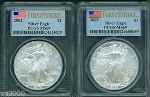 2枚のコイン：2003年と2002年のアメリ