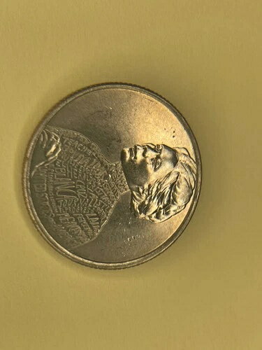 希少なERROR 2023 D Jovita Idarレディースクォーターには「In Cod We Trust」と書かれています