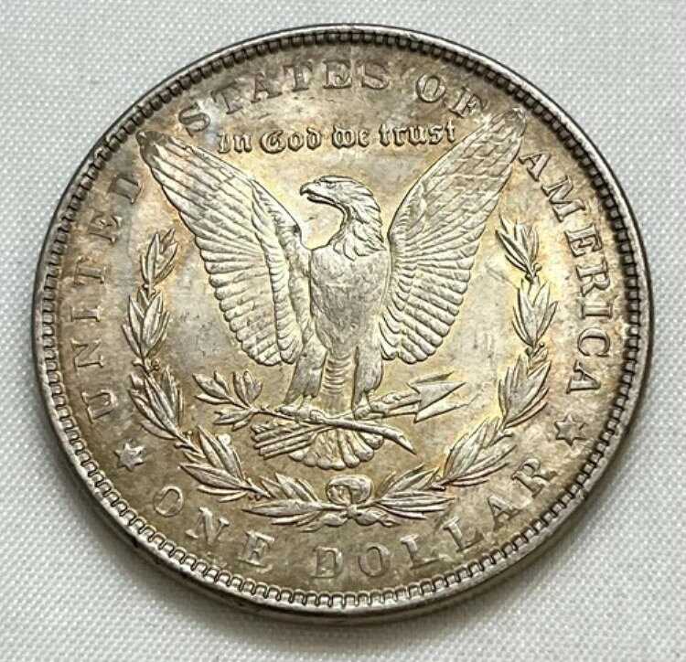1889 Morgan Silver Dollar Light Toning AU商品について額面 1ドル流通/非流通 流通コイン モルガン組成 銀発行年 1889年鋳造タイプ ビジネス純度 0.9鋳造所 フィラデルフィア等級 未鑑定製造国/地域 アメリカ合衆国認証 未鑑定注意事項※以下の注意事項をご理解のうえ、ご購入ください■ 鑑定済みコイン・紙幣について各種コイン・紙幣の鑑定機関（NGC、PCGS、PMGなど）は、収集品の真贋鑑定およびグレーディングを行う専門機関です。鑑定後の商品は、専用ケース（スラブ）に封入され、状態を示すグレードが付与されます。■ グレードについてグレードはコイン・紙幣自体の状態を評価するものであり、ケース自体の品質や状態を保証するものではありません。製造・輸送時の影響により、以下のような状態が発生する場合がございます。- 軽微なスレ傷・拭き傷（特に光の角度で見えるもの）- ケース内部のホコリ・小さな異物（鑑定機関の検品基準を満たしている場合）- ラベルのズレ・わずかな傾きこれらは鑑定機関の基準内であり、返品・交換の対象とはなりませんのでご了承ください。■ ラベルの種類について各鑑定機関では、コイン・紙幣の状態や鑑定の結果に応じて異なるラベルが付与されます。- 通常ラベル（Standard/Regular）：一般的なグレード付き鑑定済みコイン・紙幣- オーセンティック（Authentic）：グレードなしで真贋のみ保証- 詳細グレード（Details）：クリーニング跡やエッジのダメージがあるが本物と認定- 特別ラベル（Special Label）：記念版や特定のデザインの限定ラベル - 例：NGC「Early Releases」「First Releases」、PCGS「First Strike」 などグレードやラベルの種類は、商品画像および説明文をご確認のうえ、ご購入ください。■ 在庫状況について当店の商品は海外から取り寄せております。ご購入のタイミングによっては在庫切れとなる場合がございます。その際はご連絡のうえ、ご注文をキャンセルさせていただく場合がございますので、あらかじめご了承ください。■ ご注文後のキャンセルについてご注文と同時に商品のお取り寄せを開始するため、お客様都合によるキャンセルは承っておりません。■ 配送についてお届けまでに通常2〜3週間ほどかかります。海外の祝日や天候、税関手続きにより通常より配送が遅れる可能性がございます。■ 保証について商品説明に英語で「保証（warranty）」と記載があっても、日本国内では適用されませんのでご了承ください。 当店では、商品到着後7日以内の初期不良に限り、対応させていただきます。 （返品規約の詳細については、楽天市場内の会社概要欄下部をご参照ください。）■ 商品の色・素材感について撮影環境やモニター設定により、実際の商品と色味や質感が異なる場合がございます。■ 価格変動について希少性の高い商品は市場価格の変動により、追加料金をお願いする場合がございます。追加料金に同意いただけない場合には、ご注文のキャンセルが可能ですので、ご安心ください。■ その他サービスについて海外製品の輸入代行も承っております。ショップに掲載されていない商品でもお探し可能ですので、お気軽にご相談ください。尚、業者販売（業販）や複数購入の場合、割引対応も可能です。ご希望の方はお問い合わせください。