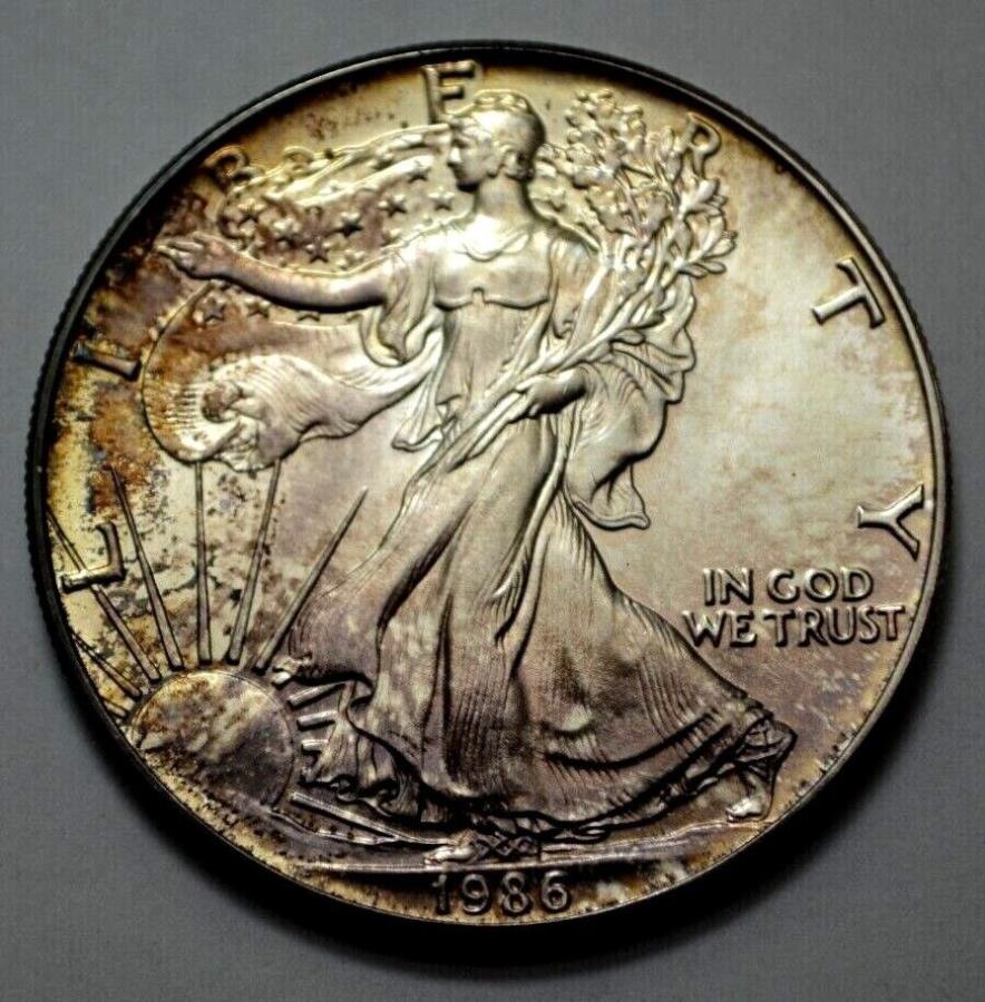  アンティークコイン モダンコイン  1986 1 oz 999アメリカンシルバーイーグルダラーコインモンスターナット。魅力的な調子 1986 1 Oz 999 American Silver Eagle Dollar Coin Monster Nat. Attractive Toning