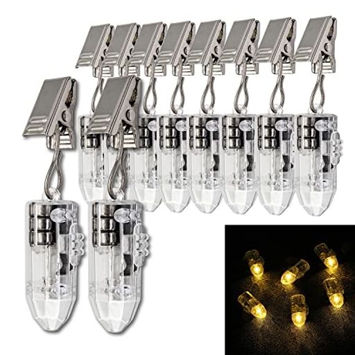 【多機能LEDバルブ】10個セット 高輝度豆電球(電池交換可能)、発光色:電球色、サイズ:約3.5*1.6*1.2cm、梱包内容:10xLEDバルブ(電池付属)、10xフッククリップ。 【複数の用途】1テントロープに掛けて、どこにロープが張られているか確認できます、夜間の転倒防止。2キャンプの飾りとしてもお勧めます。2室内や庭にぶら下がっていて、暗い環境にロマンチックな雰囲気が作り出されます。3バルーンや紙提灯に。クリスマス・祭り・イベント・結婚式・パーティーなどに最適です! 【美しいデザイン】流線型の外観に、ダイヤモンドの角を模した透明素材。 光を放つとまるで純水晶で作られたスポットライトのようで、上部から出てくる光が壁面に照りつけて雪の形をしていて美しい! 3つの1.5Vバッテリを搭載しているので、十分な光が照射されます! 【操作簡単】ステンレス製クリップを備えているので、固定したいならば、どこにでも吊るすことができます。 スイッチで簡単にコントロール出来ます(注:点灯状態を保持するには、必ず限界まで水平に押して、固定してください)。 コンパクトで、重さはわずか5gで、持ち運びに便利です。