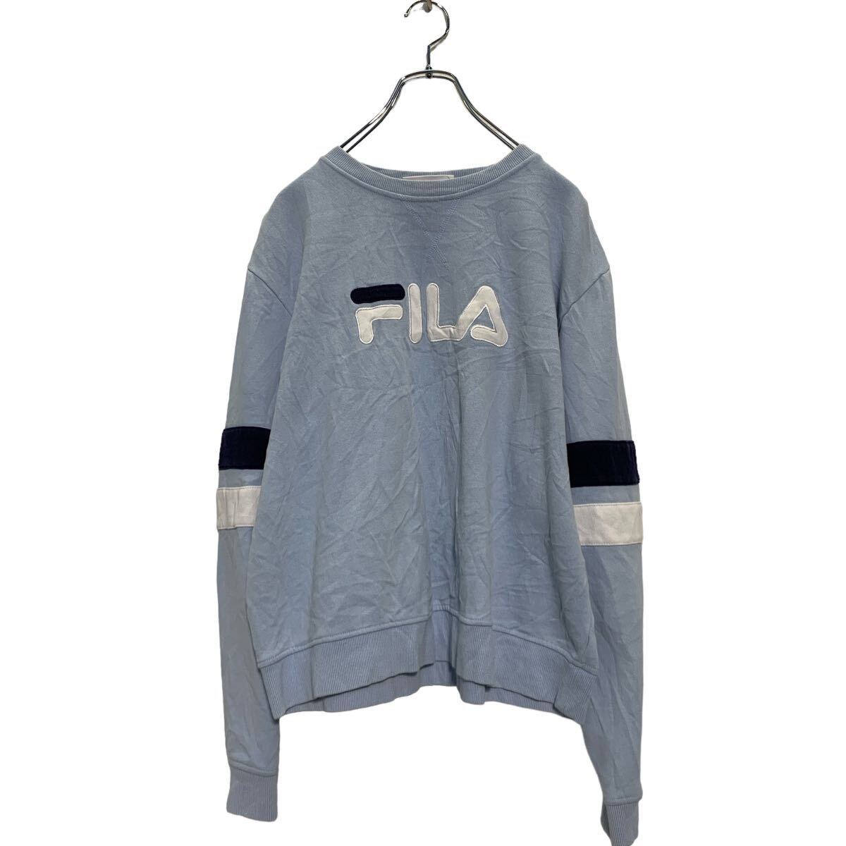 Hawaiian - 【中古】【古着】 FILA ロゴスウェット トレーナー XL ライトブルー フィラ 裏起毛 古着卸 アメリカ仕入 a606-5600