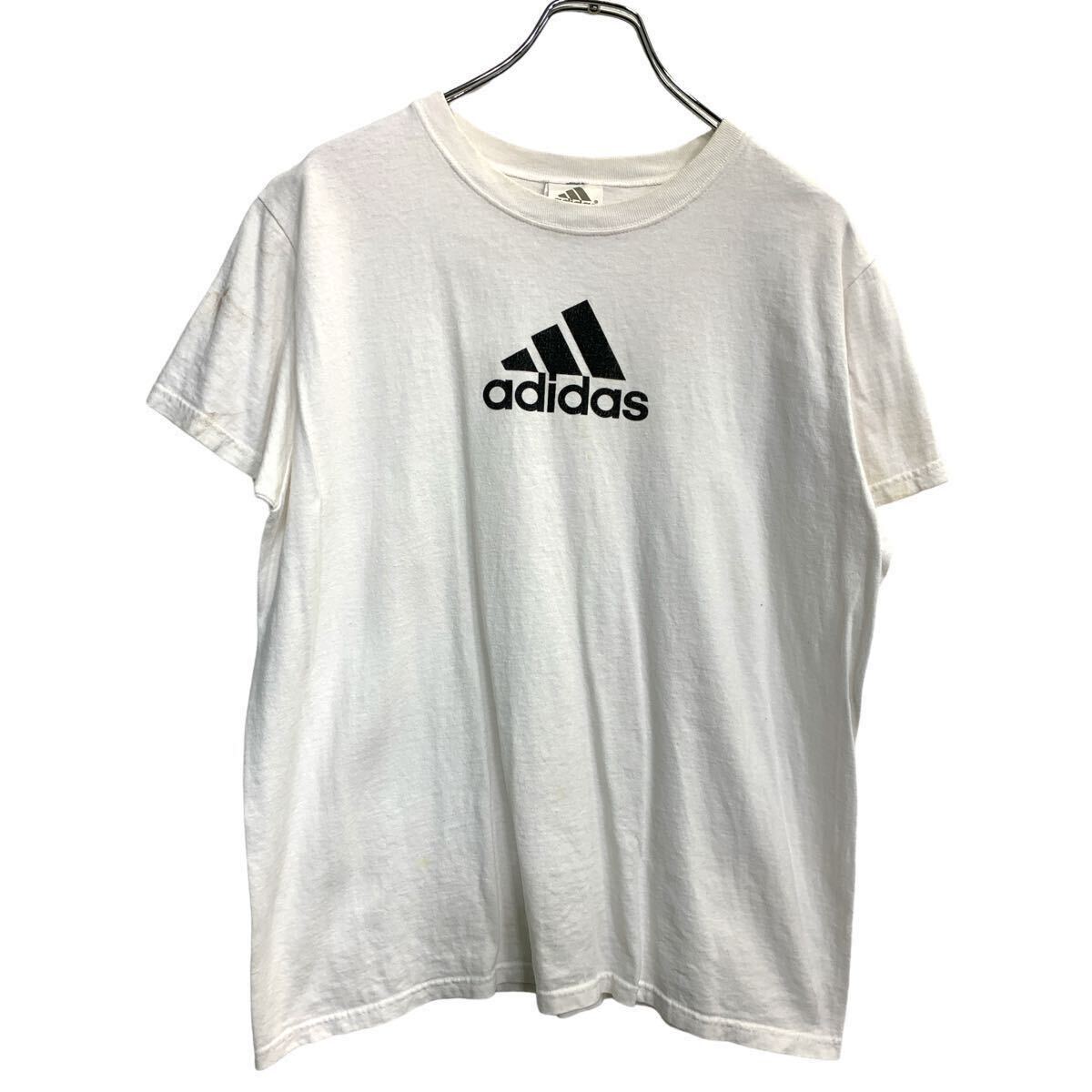 ★★複数点購入の場合は、1点分の送料で同梱発送致します。★★（合計金額が3,980円(税込)以上の場合は、送料無料となります。)商品に興味をもって頂き、誠に有難うございます。恐れ入りますが最後までお読み頂き、ご了承の上ご購入下さい。アメリカから輸入した アディダス プリントTシャツ の販売です。【商品説明】※色やデザインは画像をご覧ください。【サイズ】（海外規格の為、基本的には大きめのサイズ感となりますが、詳細は実寸をご参照ください。)サイズ表記にてXL実寸着丈 63cm 肩幅 46cm身幅 56cm袖丈 7cm (脇下から計測)・素人採寸の為、誤差についてはご容赦下さい。・着用感につきましては普段着用されているものとの実寸を比較して参考にされてください。【状態】状態確認 C ランク品 ヨゴレがあります。《ランク》A-デッドストックや未使用に近い状態B-使用感はあるが綺麗な状態C-使用感があり多少の汚れがある状態D-使用感があり汚れや破れがある状態（上記ランクは弊社基準でのランク付けとなります。あくまでも参考として頂き、詳細は画像をご確認の上、ご入札ください。また、見落としによる目立たない穴、ほつれ、破れ、汚れ等のダメージ品が混入している場合もございますことをご理解の上、ご入札をお願い致します。）・全体的に使用感はありますが着用に問題はありません。・未洗濯品です。・保管上の折りジワと、ベール品によるシワはご容赦下さい。・状態に特に敏感な方のご入札はご遠慮下さい。※不明な点がありましたらお気軽に、ご質問下さい。【発送】佐川急便で発送します。※（沖縄及び一部離島へはヤマト運輸で発送する場合があります）★★複数点購入の場合は、1点分の送料で同梱発送致します。★★（合計金額が3,980円(税込)以上の場合は、送料無料となります。)【ご注意】・落札後はノークレーム＆ノーリターンにて、お願い致します。（返品は一切お受けできません。）・古着、usedの特性等を充分にご理解頂ける方のご購入に限らせて頂きます。 古着にご理解の無い方、状態に特に敏感な方のご購入はご遠慮下さい。・サイズ感につきましては普段着用されているものとの実寸を比較して参考にされてください。・できるだけ現物に近い色味をお伝えできるように気を付けておりますが、撮影環境や使用するモニターによっては、商品と画像に若干の色誤差が生じますことをご了承ください。【営業について】 誠に勝手ながら、土曜、日曜、祝日、年末年始、ゴールデンウィークはお休みとさせて頂きます。また、お客様へのご対応時間は基本的には営業日の9:00〜17：00までになります。ご対応時間外や休業日にご落札いただいた商品や、ご質問など、頂いたご連絡への返信が滞る場合がございます。ご連絡、発送は休業明けより順次行っていきますのでご了承よろしくお願いいたします。★新商品、毎日大量入荷中です!!!20240709-0