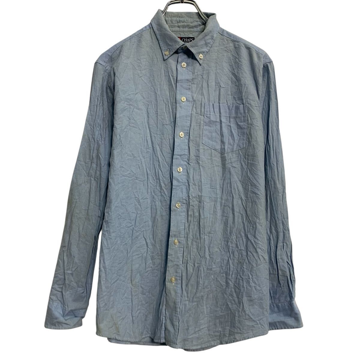 ★★複数点購入の場合は、1点分の送料で同梱発送致します。★★（合計金額が3,980円(税込)以上の場合は、送料無料となります。)商品に興味をもって頂き、誠に有難うございます。恐れ入りますが最後までお読み頂き、ご了承の上ご購入下さい。アメリカから輸入した チャップス 長袖 無地シャツ の販売です。【商品説明】※色やデザインは画像をご覧ください。【サイズ】（海外規格の為、基本的には大きめのサイズ感となりますが、詳細は実寸をご参照ください。)サイズ表記にてタグが無い為、実寸をご参照下さいませ。実寸着丈 71cm肩幅 44cm身幅 50cm袖丈 51cm(脇下から計測)・素人採寸の為、誤差についてはご容赦下さい。・着用感につきましては普段着用されているものとの実寸を比較して参考にされてください。【状態】状態確認 C〜D ランク品前身頃、両脇、両袖、後身頃に汚れが有ります。《ランク》A-デッドストックや未使用に近い状態B-使用感はあるが綺麗な状態C-使用感があり多少の汚れがある状態D-使用感があり汚れや破れがある状態（上記ランクは弊社基準でのランク付けとなります。あくまでも参考として頂き、詳細は画像をご確認の上、ご入札ください。また、見落としによる目立たない穴、ほつれ、破れ、汚れ等のダメージ品が混入している場合もございますことをご理解の上、ご入札をお願い致します。）・全体的に使用感はありますが着用に問題はありません。・未洗濯品です。・保管上の折りジワと、ベール品によるシワはご容赦下さい。・状態に特に敏感な方のご入札はご遠慮下さい。※不明な点がありましたらお気軽に、ご質問下さい。【発送】佐川急便で発送します。※（沖縄及び一部離島へはヤマト運輸で発送する場合があります）★★複数点購入の場合は、1点分の送料で同梱発送致します。★★（合計金額が3,980円(税込)以上の場合は、送料無料となります。)【ご注意】・落札後はノークレーム＆ノーリターンにて、お願い致します。（返品は一切お受けできません。）・古着、usedの特性等を充分にご理解頂ける方のご購入に限らせて頂きます。 古着にご理解の無い方、状態に特に敏感な方のご購入はご遠慮下さい。・サイズ感につきましては普段着用されているものとの実寸を比較して参考にされてください。・できるだけ現物に近い色味をお伝えできるように気を付けておりますが、撮影環境や使用するモニターによっては、商品と画像に若干の色誤差が生じますことをご了承ください。【営業について】誠に勝手ながら、土曜、日曜、祝日、年末年始、ゴールデンウィークはお休みとさせて頂きます。また、お客様へのご対応時間は基本的には営業日の9:00〜17：00までになります。ご対応時間外や休業日にご落札いただいた商品や、ご質問など、頂いたご連絡への返信が滞る場合がございます。ご連絡、発送は休業明けより順次行っていきますのでご了承よろしくお願いいたします。★新商品、毎日大量入荷中です!!!20250304-0