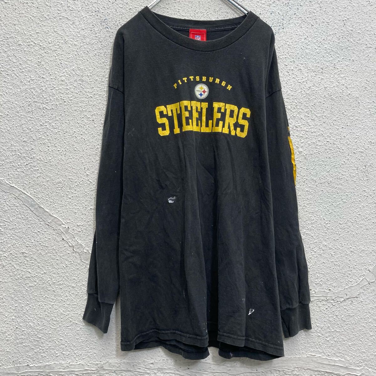 【中古】【古着】 NFL 長袖 プリントTシャツ ブラック XL ビッグサイズ 袖プリント アメフト ロンT ロングTシャツ 古着卸 アメリカ仕入 a703-5820