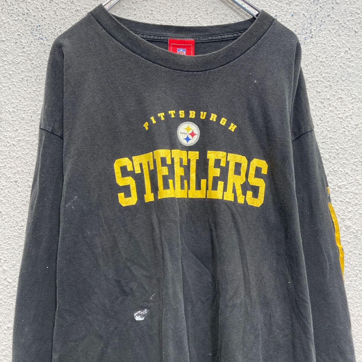 【中古】【古着】 NFL 長袖 プリントTシャツ ブラック XL ビッグサイズ 袖プリント アメフト ロンT ロングTシャツ 古着卸 アメリカ仕入 a703-5820