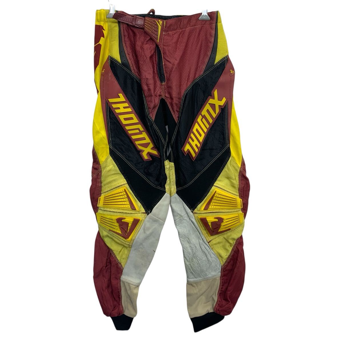 Rakuten - 【中古】【古着】 モトクロスパンツ 30 S〜 エンジ系 マルチカラー ジップアップ レーシングパンツ スポーティー ボトムス 古着卸 アメリカ仕入 2505-273