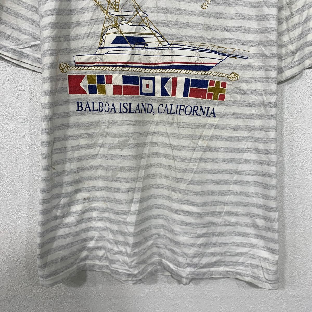 【中古】【古着】 MILLER 半袖 プリントTシャツ XL ホワイト グレー プルオーバー ビッグサイズ アメリカ製 ボーダー 90's 古着卸 アメリカ仕入 a705-5999