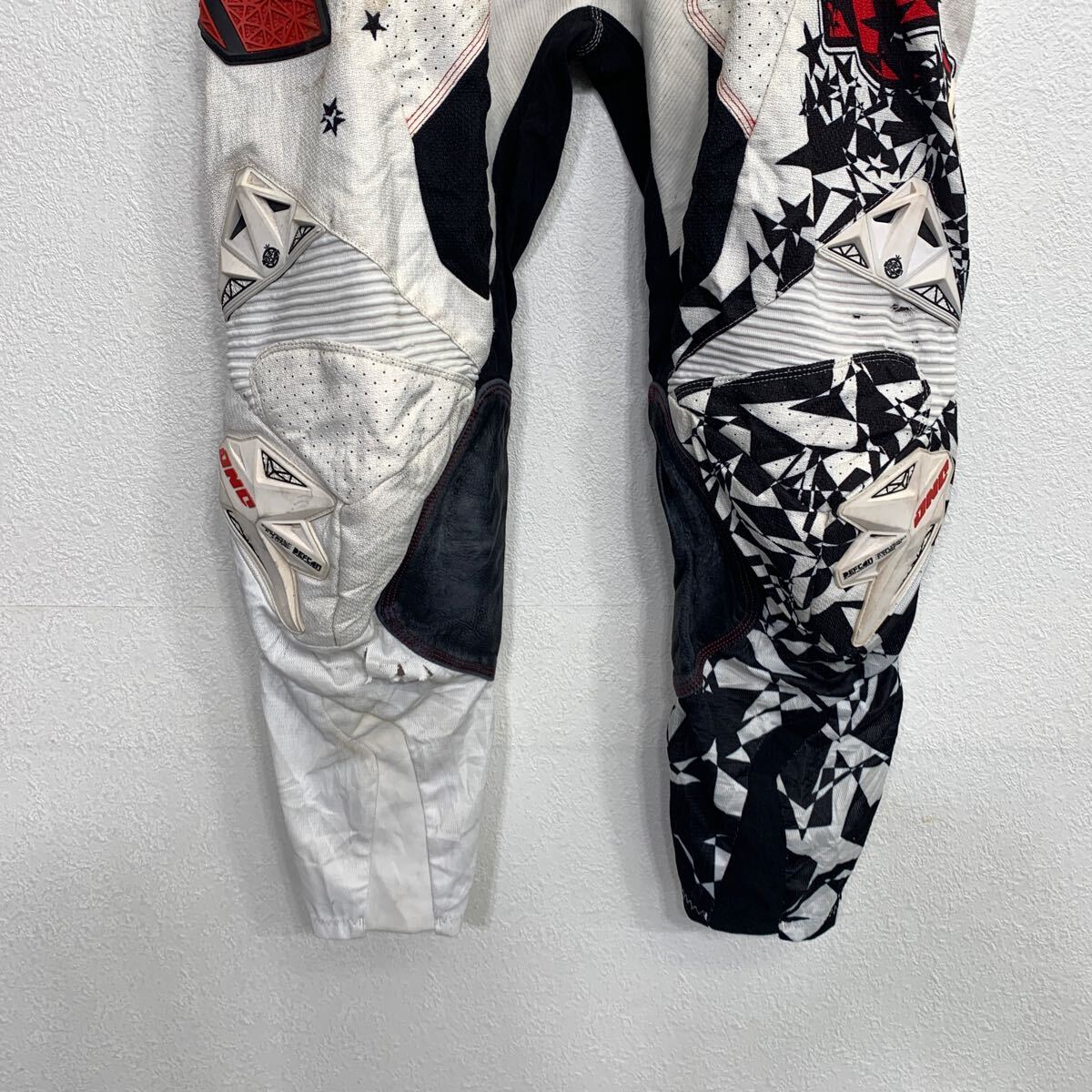 【中古】【古着】 JNC モトクロスパンツ W36 ホワイト ブラック レッド ジップアップ レーシングパンツ 古着卸 アメリカ仕入 2505-694