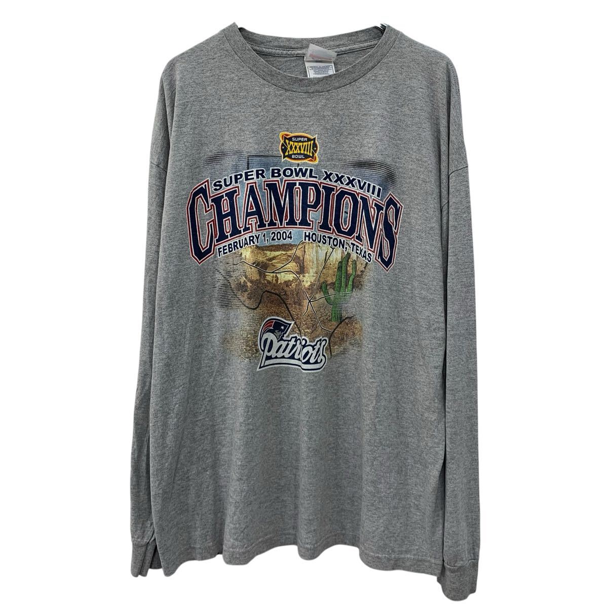 【中古】【古着】 USA製 AAA 長袖 プリントTシャツ 2XL グレー マルチカラー トリプルエー プルオーバー ビッグプリント バックプリント 春物 a711-5300