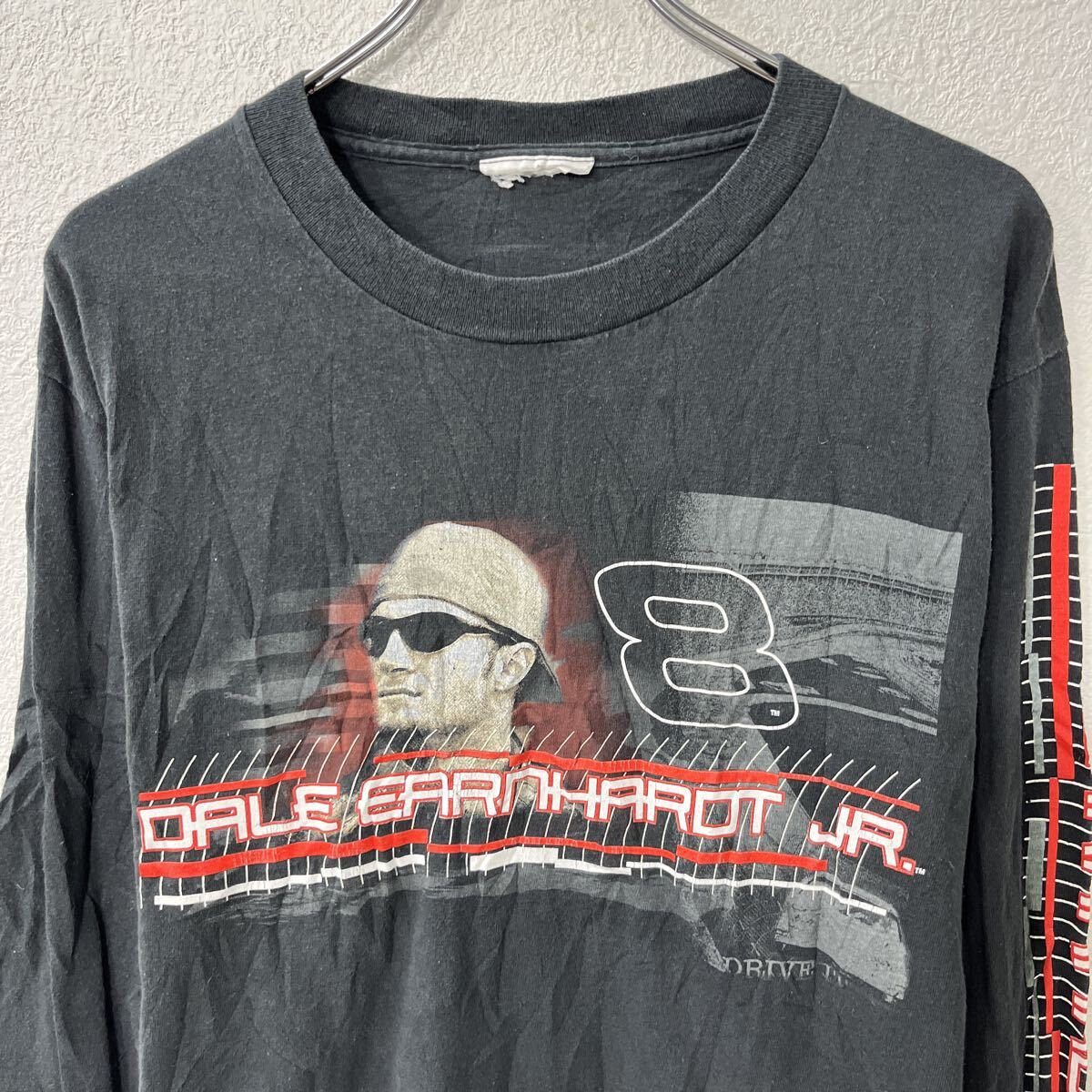 【中古】【古着】 長袖 プリントTシャツ XL〜 ブラック ビックプリント スリーププリント ロンT プルオーバー トップス 春物 a803-5255 2