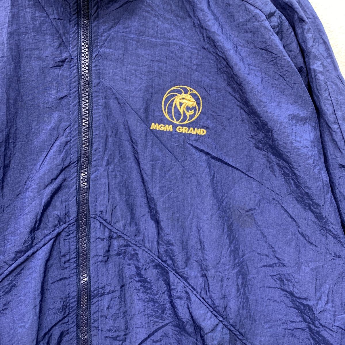 【中古】【古着】 TODD1 ナイロンジャケット L ネイビー ジップアップ ワンポイント刺繍 ラグラン スポーティー アウター ジャケット 春秋物 a803-5480