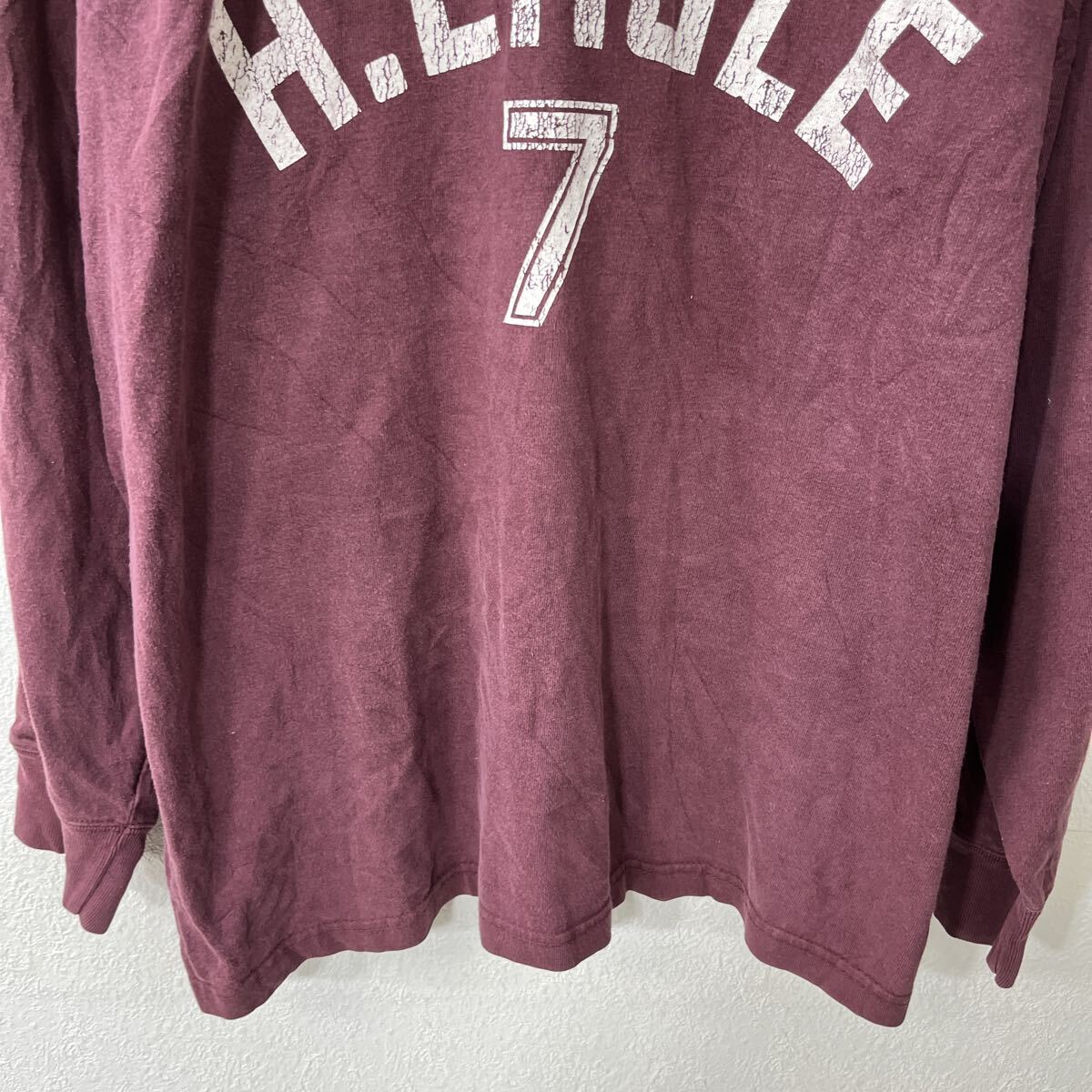 【中古】【古着】 AMERICAN EAGLE OUTFITTERS 長袖 プリントポロシャツ XL ワインレッド プルオーバー ラガーシャツ ラグラン トップス 秋物 a803-5792