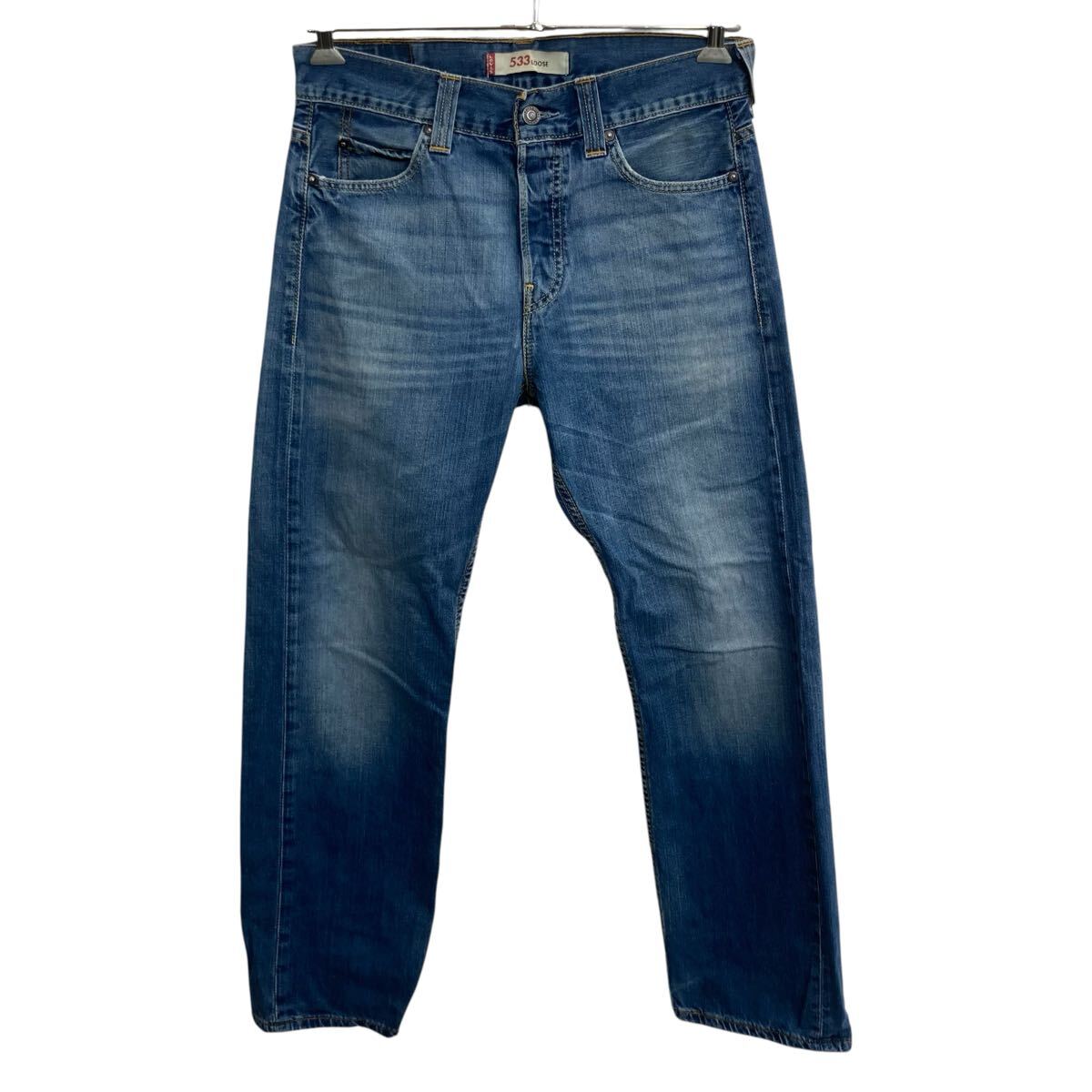 【中古】【古着】 Levi's 533 デニムパンツ W30 ブルー リーバイス ボタンフライ ルーズ 紙パッチ コインポケット アメカジ デニム ジーンズ 2604-465