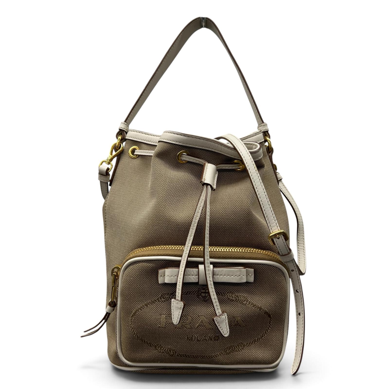 PRADA 極美品 プラダ LOGO JACQUARD ロゴジャガード バケットバッグ 2way ハンドバッグ ショルダーバッグ 1BH097 キャンバス レザー リボン 巾着 Aランク 鑑定済 中古 プラダバッグ watch-master-10002603 ラグゼル 楽天市場店 パッケージ画像