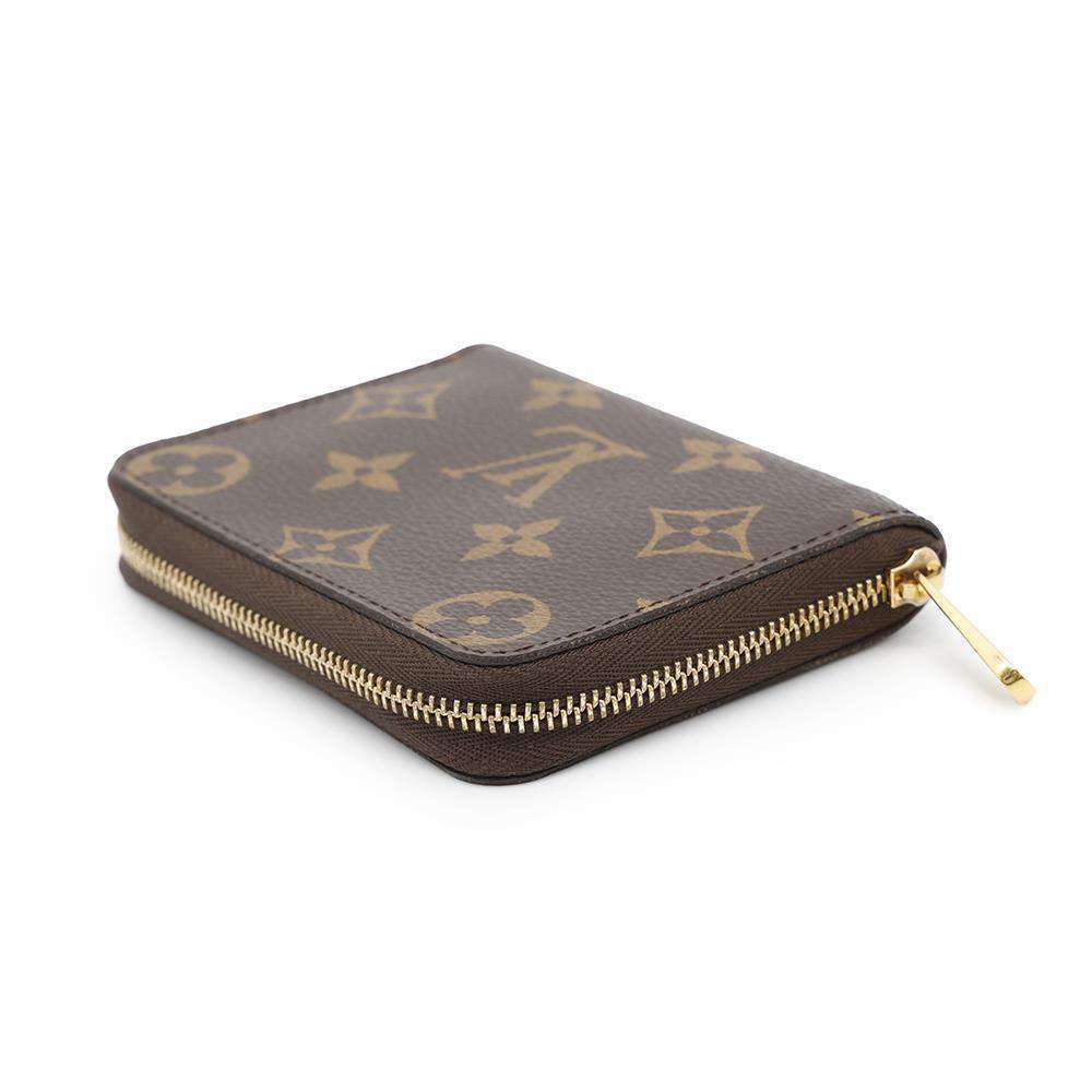 LOUIS VUITTON ルイヴィトン小銭入れ付き三つ折り長財布モノグラムアンプラントレザープリントエンボスカウハイドレザー ブラック×ベージュ ベージュ×クリームフラップ付きエンヴェロップヴィクトリーヌウォレットルイビトン 3つ折り財布