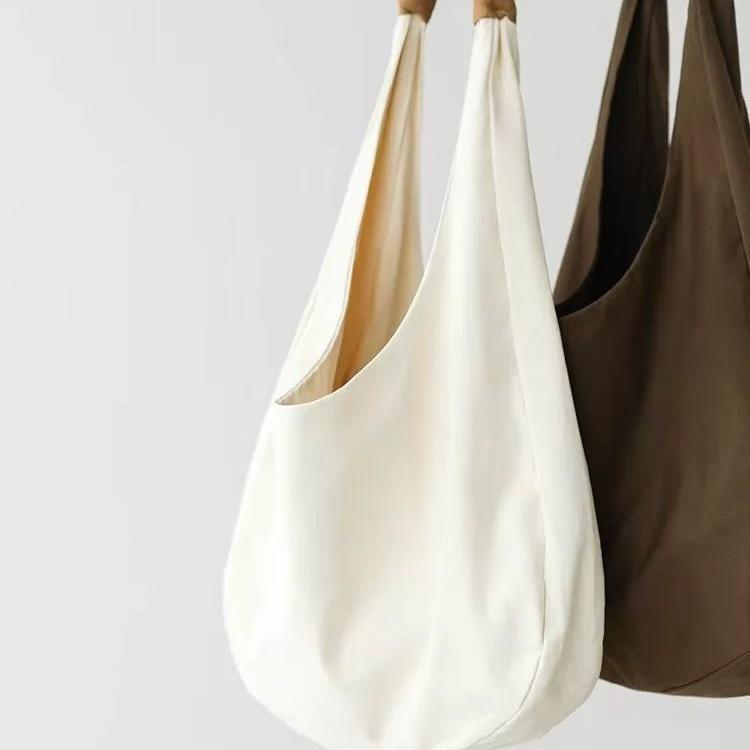 トートバッグ レディース デザイン性 個性的 キャンバス 鞄 カジュアル リラックス ルーズ感 ショルダ..