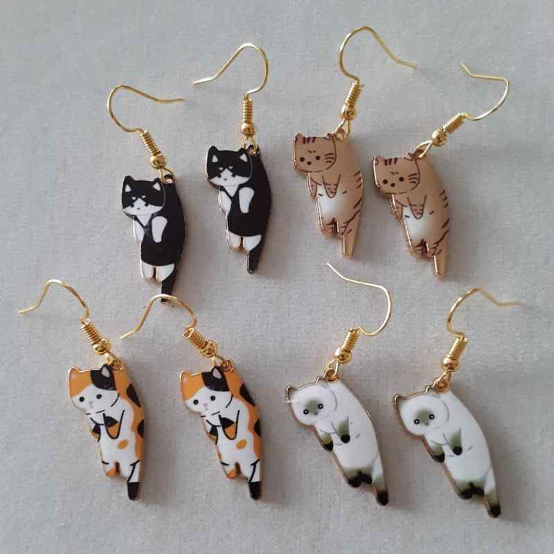 ピアス レディース 猫 ネコ アニメ キャラクター かわいい キュート 遊び心 ユニーク 幾何学模様 ジオ..