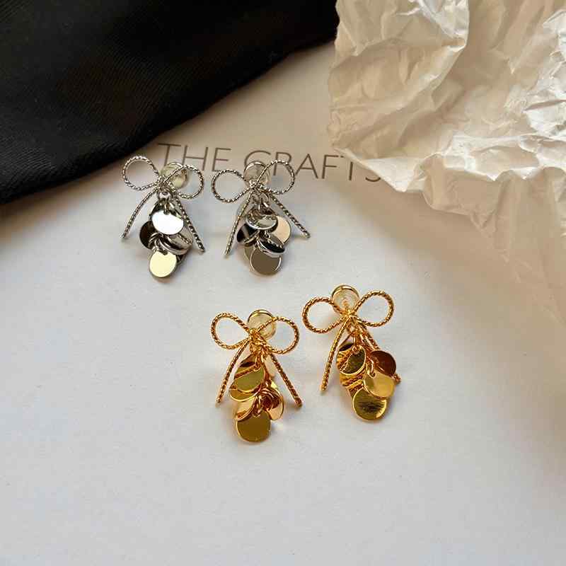 ピアス イヤリング レディース ゴールド リボン スパンコール スタッド 銅製 金メッキ シンプル ユニー..