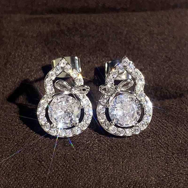 ピアス レディース ひょうたん リボン スタッドピアス かわいい 上品 エレガント フェミニン 繊細 普段使い 銅製 電気メッキ シルバー 耳飾り アクセサリー