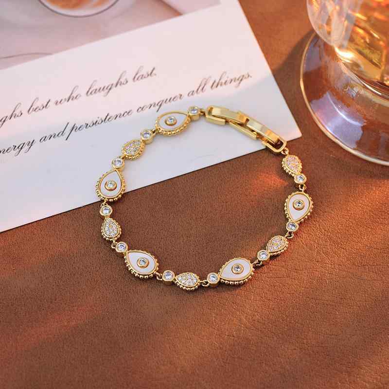 ピアス レディース 女性用 イービルアイ 悪魔の目 モチーフ 幾何学 欧米風 ファッション シンプル 高級感 普段使い 通勤 オフィス 銅製 電気メッキ加工 ゴールド 金色