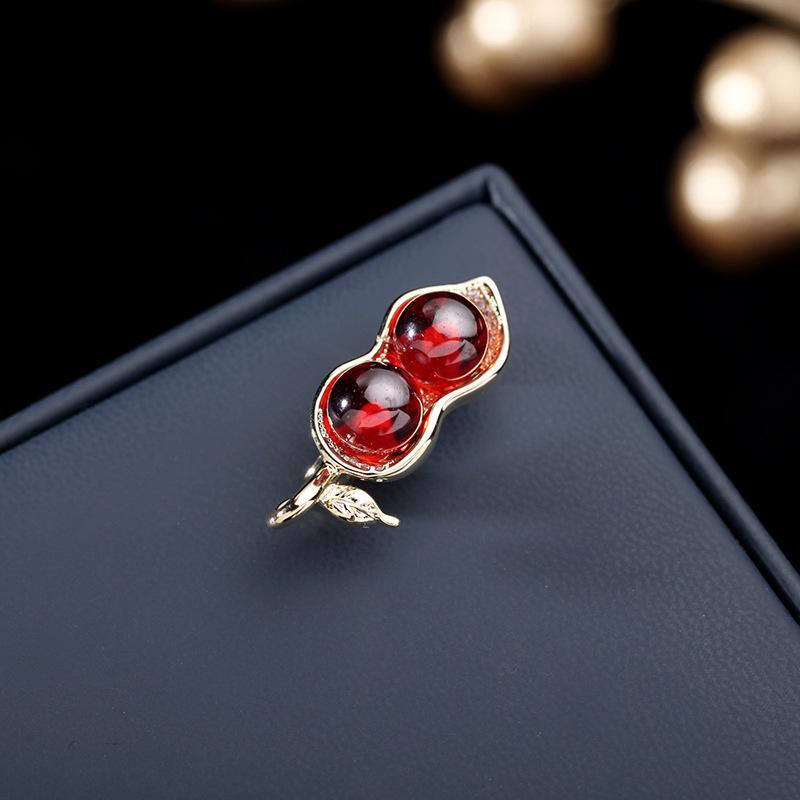 ブローチ 男女兼用 ユニセックス 高級感 シンプル キャッツアイストーン飾り 2色 バイカラー ピーナッ..