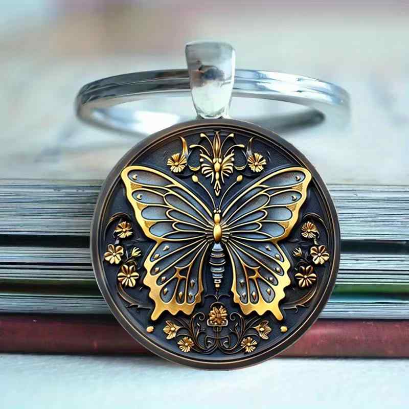 キーホルダー ファッション おしゃれ 亜鉛合金製 モダン アート風 ブルーゴールド 蝶々モチーフ カボションチャーム キーリング プレゼント ギフト