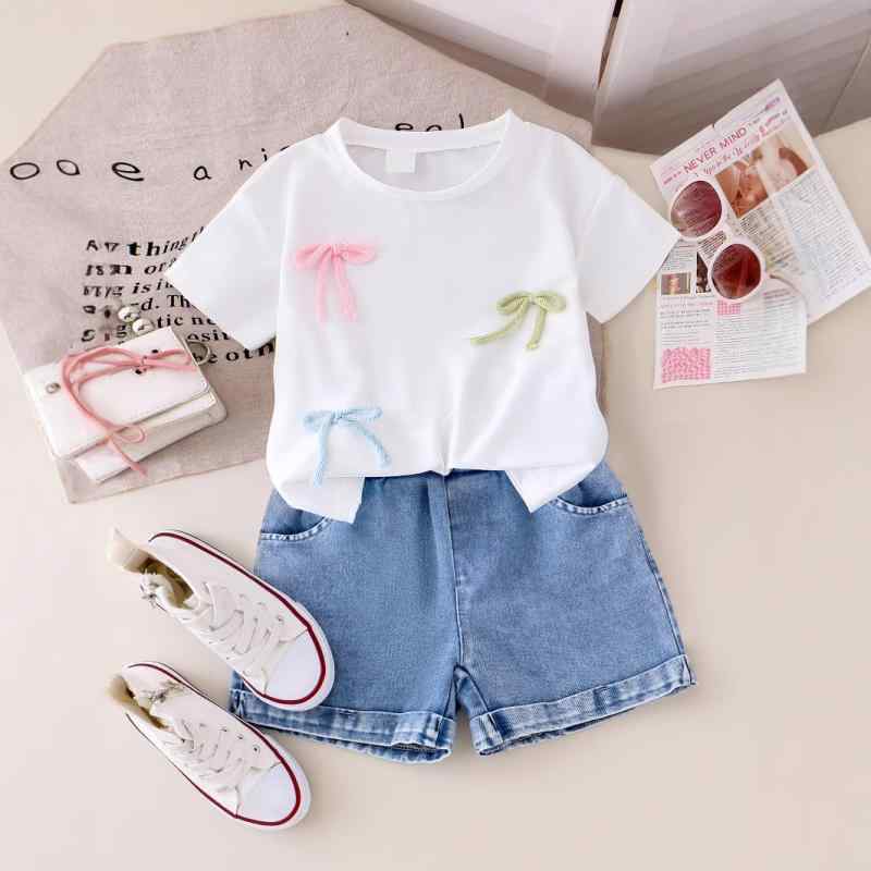 パンツセットアップ 女の子 キッズ 小学生 欧米風 カジュアル 春夏 リボン 半袖 綿Tシャツ ウォッシュドデニム ショートパンツ 2点セット ソフトな肌触り ホワイト