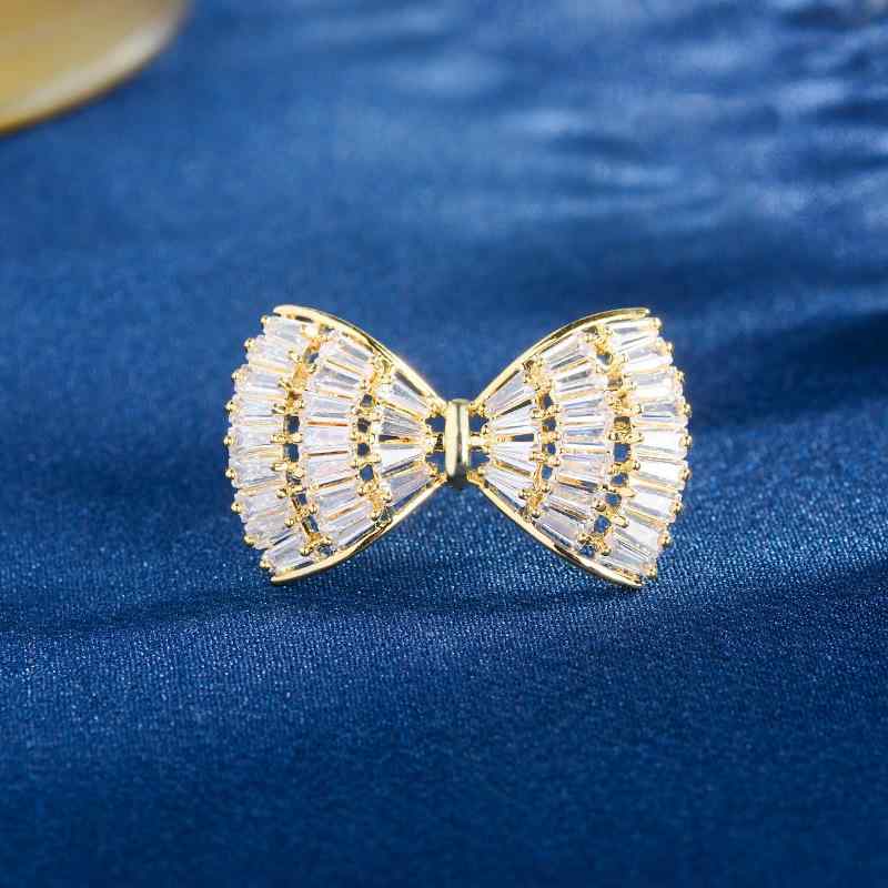 ブローチ 男女兼用 リボン フラワーモチーフ ジルコニア マイクロセッティング 銅製 電気メッキ加工 ス..