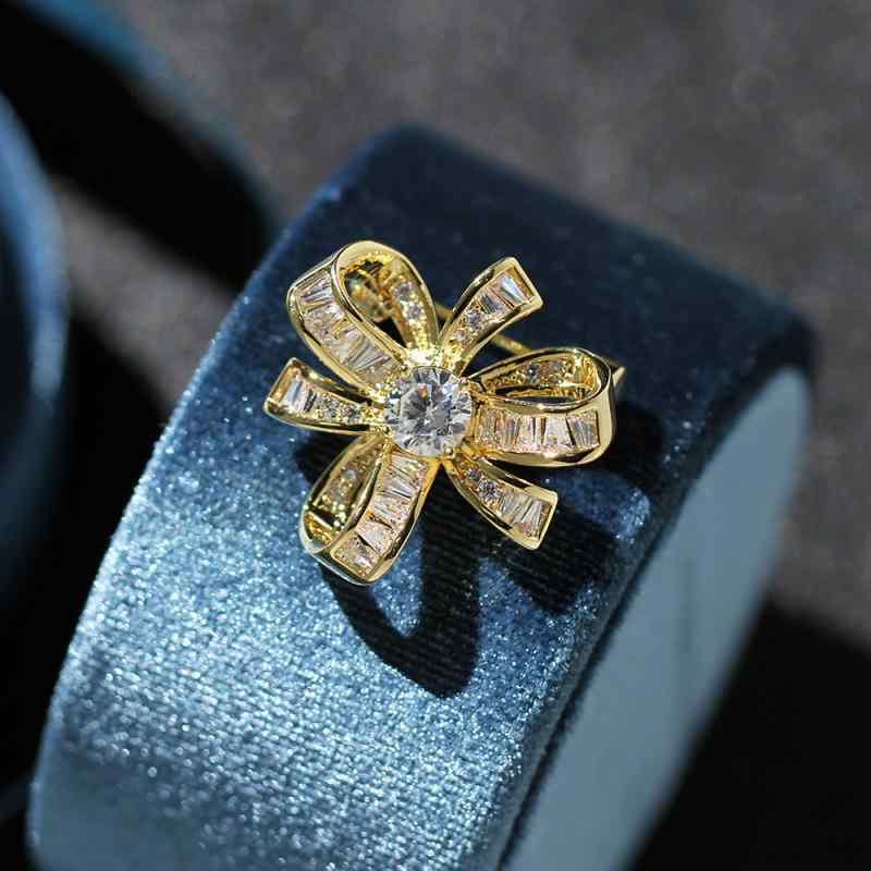 ブローチ レディース 女性用 花 フラワー ストーン飾り 結び目 リボン 上品 エレガント ゴールド シルバー 2色 ピン ラペルピン オフィス 通勤 アクセサリー 銅製 電気メッキ加工