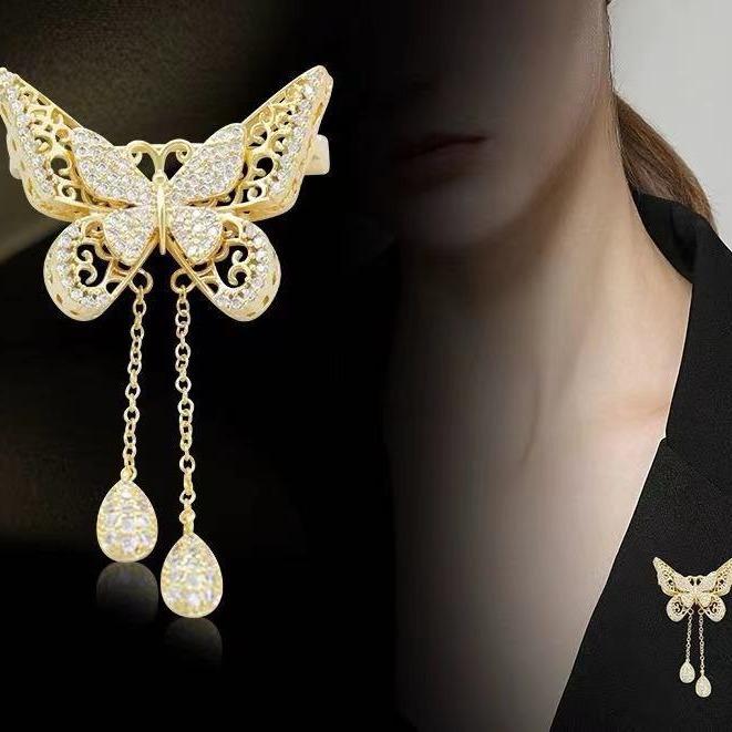 ブローチ レディース パール タッセル 蝶 バタフライ 透かし彫り オープンワーク 合金製 電気メッキ加..