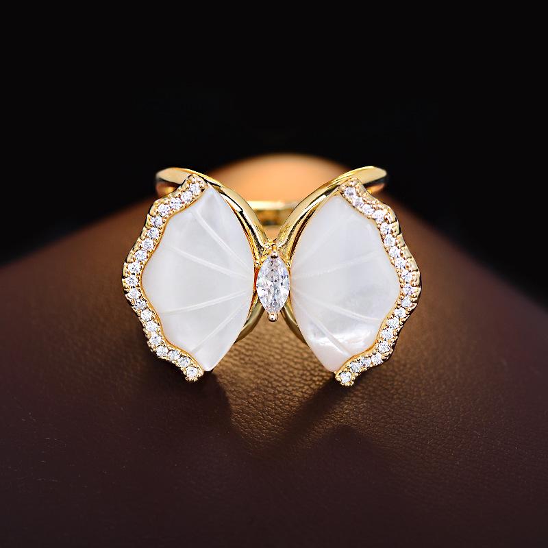 スカーフリング ユニセックス 韓国風 おしゃれ 軽やかな高級感 天然貝殻 リボン マイクロパヴェ ジルコ..