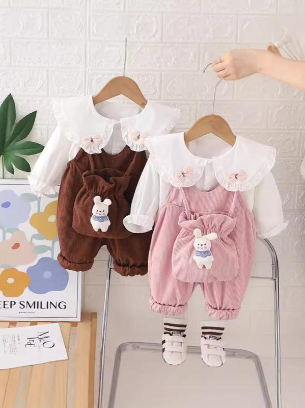 ・カテゴリ: キッズセットアップ・性別: 女・スタイル: カジュアル・セットアップ種類: パンツセットアップ・セット点数: 2点セット・セット内容: 服・対象年齢: 1～3歳・対応身長: 80～100cm・袖丈: 長袖・パンツ丈: ロング丈・加工: 柔らか・厚さ: 普通・柄: カートゥーン・写真: モデルなし・特徴: セットアップ、カートゥーン、サロペット、プリント、股開閉可能・主な素材: 綿・素材含有率: 75%・開閉: シングルボタン・カラー展開: ピンク、コーヒー・サイズ展開: 80cm, 90cm, 100cm, 110cm, 120cm