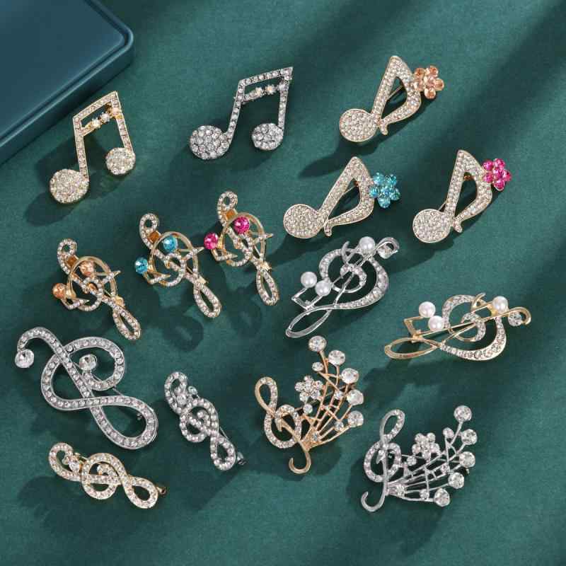 ブローチ 男女兼用 音符 音楽モチーフ ラインストーン キラキラ 輝く 高級感 エレガント 上品 個性的 ..
