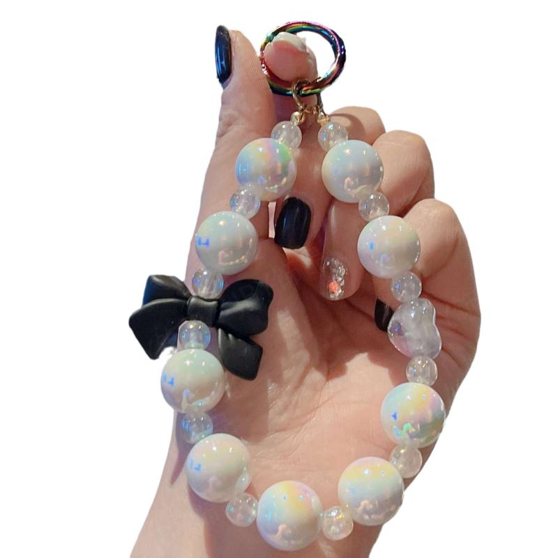 ・処理工程: 塗装、焼付塗装、メッキ・素材: アクリル・カラー: 紫、スカイブルー、ピンク、ブラウン、イエロー、グリーン・スタイル: 韓国風・タイプ: キーホルダー・柄: 蝶結び・デザイン要素: パール、雲、虹・テイスト: フレッシュ、スイート