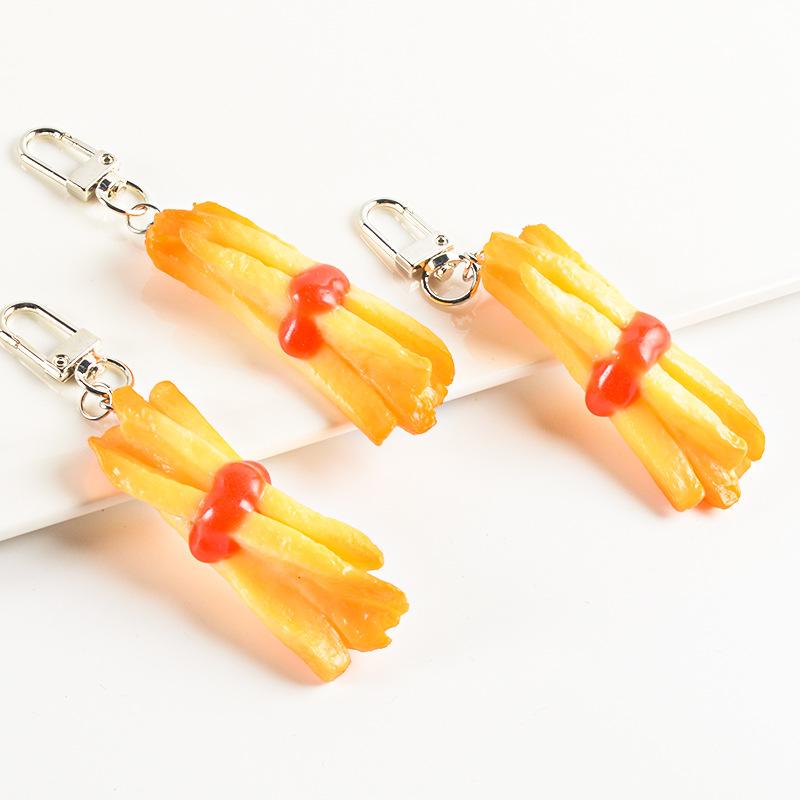 キーホルダー フライドポテト PVC製 リアル 食品サンプル ミニチュア バッグチャーム ユニーク 面白い フェイクスナック おもしろグッズ 普段使い カジュアルアクセサリー(x2)