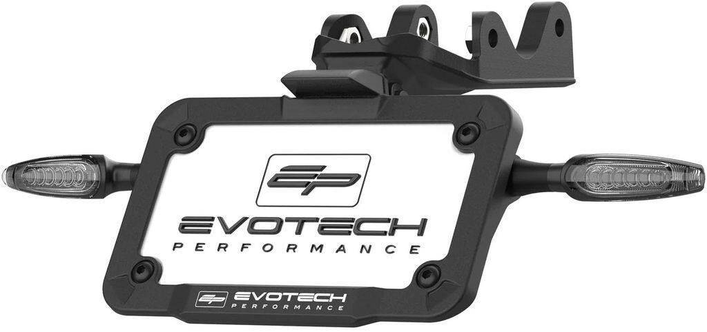 ■詳細説明【ヤマハYZF-R9用ウインカー一体型Evotech Dynamicフェンダーレスキットの主な特長】・EvotechPerformanceの特注モーターサイクルフェンダーレスキットは、OE挿入ポイントにシームレスに取り付けられます。・軽量アルミニウムとCNCレーザー加工コンポーネントを含む材料の組み合わせから製造されています。・ピボットシステムにより、ライダーはナンバープレートを好みの傾斜角度に設定したり、六角レンチを使用して所定の位置に固定することで法規制に準拠した角度で確実に固定できます。・道路走行対応をうたうLEDナンバー灯およびEvotechシーケンシャルウインカー用の車種専用配線カプラーにより、カプラーオンでの取り付けが可能です。・Evotech Performanceシーケンシャルウインカーは、操作の合図時に非常に優れた視認性を発揮します。・LEDウインカーは耐久性があり、軽量なアルミニウムハウジングを採用しています。・インターフェースプレートとライセンスホルダーは軽量アルミニウムからCNC加工されており、EPの特徴であるマットブラックパウダーコーティングとロゴが施されています。・105mmx182mm(4.13inx7.16in)のライセンスホルダープレートにはCNC加工による凹部があり、軽量かつ魅力的な美しさを実現しています。・射出成型されたABSフロントベゼルは、機能に影響を与えることなく使用または取り外しが対応します。・キットには黒色のステンレス製フィッティング、TPUウインカー接続スリーブ、スパナ、ケーブルタイも含まれています。EvotechDynamicフェンダーレスキットは、ヤマハYZF-R9用のウインカーを備えており、他に類を見ない完全なカプラーオンパッケージを提供します。シーケンシャルEvotechウインカーはウインカーブラケットにしっかりと取り付けられ、必要な配線はすべてキットに含まれています。Dynamicフェンダーレスキットには調整可能なピボットも付いており、ライダーはナンバープレートを好みの角度に配置したり、バイクのテールの下に押し込んで見た目をすっきりさせることができます。この動作はウインカーや配線には影響しません。すべてのEvotechPerformance製品と同様に、パーツは高品質で耐久性のある素材を使用して英国で製造されています。■注意点※ナンバープレートサイズが日本の規格ではない場合があります。取り付ける際にはステーによる加工などが必要となりますのでご注意ください。※取扱説明書が付属する場合は外国語となります。※輸入商材の為、納期が遅れる場合がございます。あらかじめご了承ください。※メーカー都合により商品の仕様変更がある場合がございます。ご了承ください。※画像には他の商品が含まれている場合があります。■適合車種YZF-R9&ensp;YZF-R9 年式: 25-