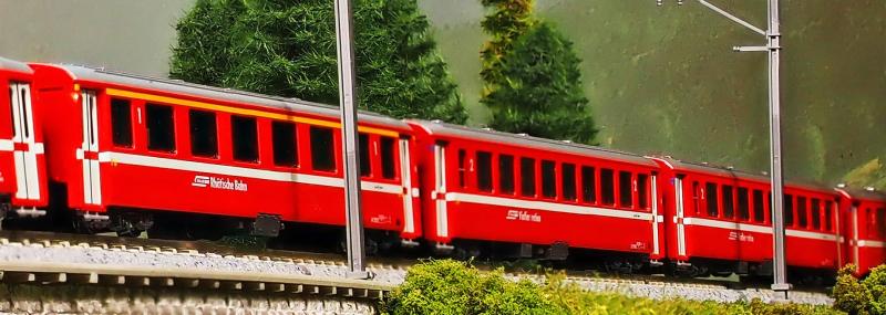 KATO Nゲージ アルプスの赤い客車 EWI 増結セット 4両 10-1414 鉄道模型 客車本線系統用の18.5m車、メーターゲージと呼ばれる狭軌鉄道を1/150で製品化。赤色の車体に細い銀帯を入れた1980年代以降の塗装色を再現。2004年以降採用され始めた太い帯のタイプも再現。一部車両を従来製品とは異なる車番で製品化。