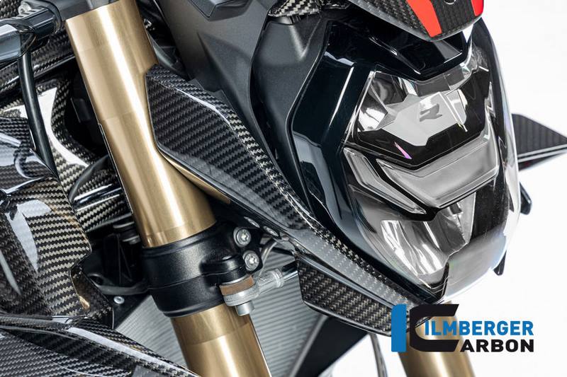 BMW S 1000 RおよびM 1000 R用カーボン製サイドカバー完璧なフィット感と簡単な取り付けオリジナルの取り付けポイントを使用して、オリジナルパーツを交換します。素早く簡単に取り付け可能。高品質素材とユニークな外観イルムベルガーのために特別に製造されたプリプレグ素材を使用。フォーミュラ1や航空宇宙分野で使用され、最高の品質を誇ります。高光沢のクリアーコーティングで独特の深み効果を演出。耐久性と環境保護ユニークなプラスチックコーティングにより、環境の影響から保護。紫外線からの最適な保護。品質と認証T?V認証品質。ISO 9001規格に基づく製造。ABE-追加登録不要。設置準備完了すぐに取り付け可能な状態でお届けします。BMW S 1000 RまたはM 1000 Rに、この高品質カーボン・カバーを装着して、個性的な外観を与えてください！イルムベルガーのカーボン・パーツを選ぶ人は誰でも知っています：完成品までの道のりは厳しく、最高の精度が要求されます。イルンベルガー・カーボンが情熱とノウハウをもってどのようにパーツを製造しているかは、製造工程に関する詳細なレポートをご覧ください。イルンベルガーのカーボン・パーツには、どれほどの情熱と技術的センスが込められているのか、ぜひご覧ください。