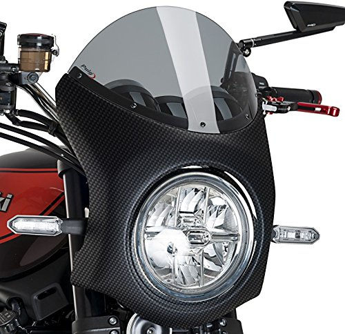 適合車種: KAWASAKIZ900RS (2018-2023)Z900RS SE (2022-2023)記事コード：9596HEAN バーコード : 8435529300713昨今、レトロなバイクがブームになっていますが、Puigもそれを認識しています。そのため、風からあなたを守り、あなたの宝石のヴィンテージイメージを高めるために、新しいレトロなセミフェアリングをデザインしました。耐衝撃性に優れたABS素材を使用しており、突風や悪天候からライダーを守り、快適なライディングを実現するとともに、マシンのレトロで美しいラインを強調します。フェアリングは、マットブラックまたはカーボン調に仕上げられた不透明なボディと、クリア、ダーク、ブラックまたは透明なスモークスクリーンで構成されています。Puigは、バイクのヘッドライトの直径に応じて、2種類のフェアリングを用意しています。195mmと180mmの2種類です。また、最も人気のあるモデルには、専用の接着キットを使用したサポートを用意しています。ユニバーサルモデルをご希望の場合は、様々なモデルのバイクに装着できるマウントキットをご用意しています。レトロなPuigのセミフェアリングは、ゲルマのテストを受けています。適合車種 KawasakiZ900RS (2018-2021)