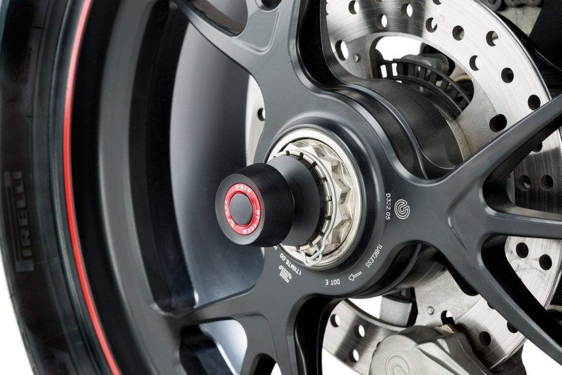 適合車種: DUCATIMULTISTRADA 1260 (2018-2020)MULTISTRADA 1260 PIKES PEAK (2018-2020)MULTISTRADA 1260 S (2018-2020)MULTISTRADA 1260 S D AIR (2018-2020)PANIGALE 1000 V4R (2019-2023)PANIGALE 1100 V4 (2018-2023)PANIGALE 1100 V4 SP (2021-2021)PANIGALE 1100 V4 SP2 (2022-2023)PANIGALE 1100 V4S (2018-2023)PANIGALE V2 (2020-2023)PANIGALE V2 BAYLISS (2021-2023)STREETFIGHTER V2 (2022-2023)STREETFIGHTER V4 (2020-2023)STREETFIGHTER V4 SP (2022-2023)STREETFIGHTER V4S (2020-2023)SUPERSPORT 950 (2021-2023)SUPERSPORT 950 S (2021-2023)EAN バーコード : 8435529307347記事番号：20059Puigの新しいPHB 19リアアクスルスライダーを使用して、オートバイのスイングアームをより強力に保護します。 265 GRの重量が減少したナイロンブロックから機械加工すると、サスペンションを強化しながら、バイクのこの繊細な領域を保護します。保護機能に加えて、レーススタイルに触発されたデザインは、自転車の真の競争力のあるキャラクターを示します。カラーブラックのキャップには、車軸スライダーとともに供給されます。作品に色のタッチを追加したい場合は、自転車のルックスに最適な色の陽極酸化リングを購入できます。