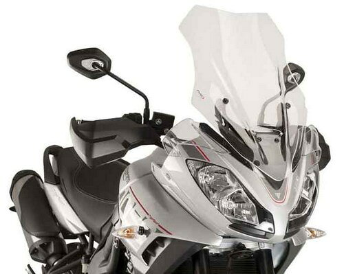 適合車種: TRIUMPHTIGER SPORT (2016-2020)記事コード：9200WEAN バーコード : 8436563733314ツーリングPUIGスクリーンは、路上で遭遇するあらゆる衝撃や物体から体を守ります。3mmまたは4mm（モデルにより異なる）の高衝撃アクリルで製造されたこのスクリーンは、ドライバーの安全性と保護を向上させ、その最高の高さが他のスクリーンとの差別化ポイントとなっています。スクリーンの輪郭は2mmの丸みを帯びており、ドイツのT?V（テュフ）の規定に準拠しています。当社のスクリーンは、モデルに応じて、組み立てと空力検討の指示書を添付してお届けします。