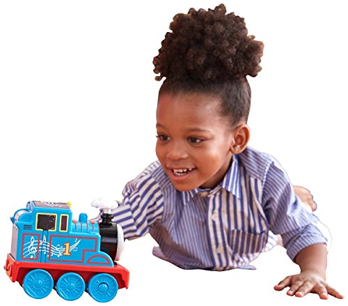 【商品名】Fisher-Price My First Thomas the Train Rolling Melodies Thomas 【カテゴリー】おもちゃ：赤ちゃん・知育玩具【商品詳細】 Join the No. 1 blue engine on a musical adventure and experience the sounds of Thomas & Friends with fun, beneficial play that can help your child develop. Rolling Melodies Thomas from Fisher-Price features multiple activation points, so children can touch Thomas' boiler bands, coal bin, whistle and steam cloud to hear a variety of sounds and musical surprises, including a piano, drums, whistles and fun phrases. As they push him along, they'll also hear the Thomas & Friends theme song. When children touch the activation points to explore the different features, they're using fine motor skills, curiosity and logical thinking to join their friend Thomas on a magic, musical journey. Playtime becomes an interactive treat for your child's senses as Rolling Melodies Thomas brings the sounds of Sodor to life.