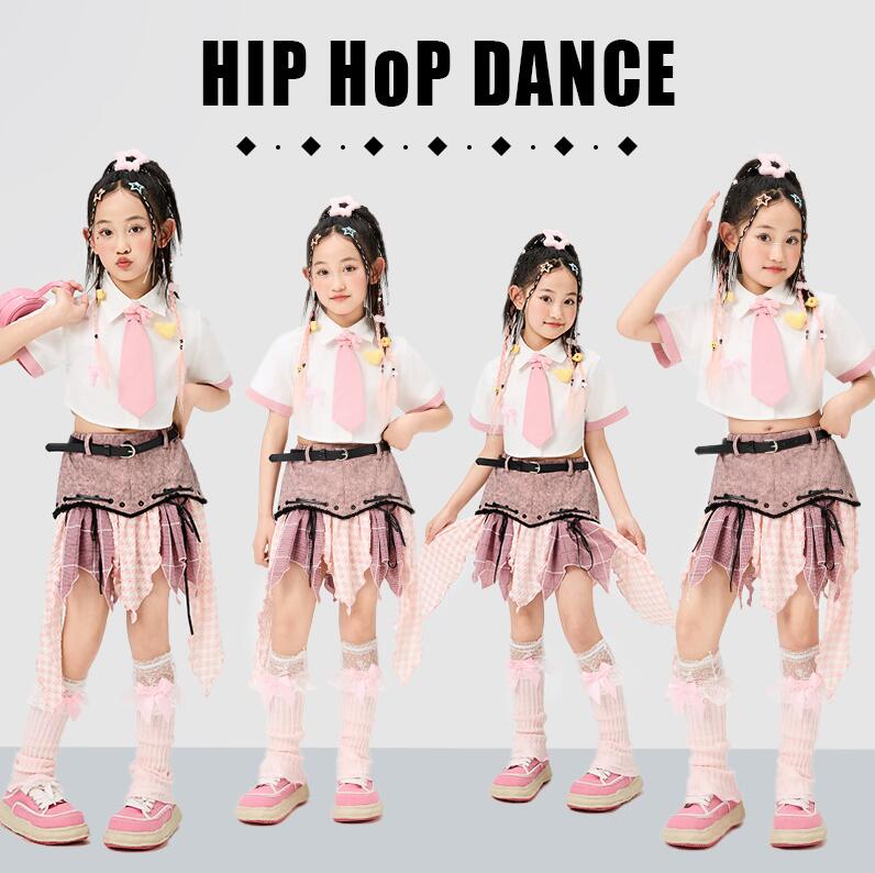 子供ダンス衣装　ピンク系半袖ブラウス　臍出し　イレギュラー切り替えスカート　ネクタイ　夏女の子舞台ダンスウェア　子供ヒップホップジャズダンスウェア　チアダンス服　舞台演出服　イベント　キッズステージ演出hiphopjazzウェア