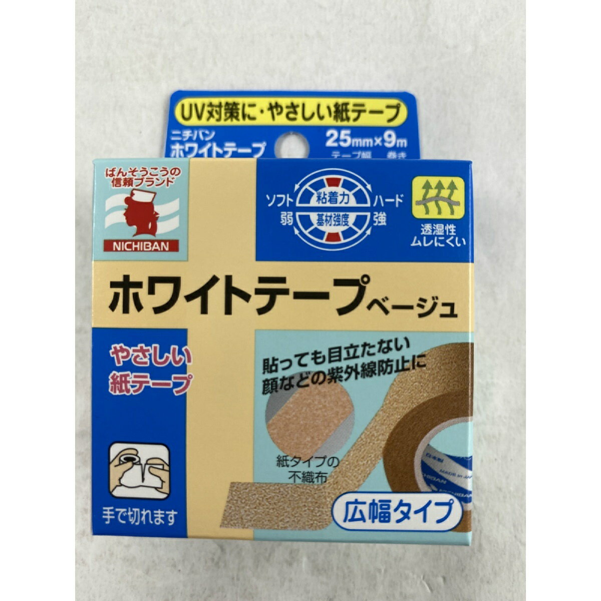 ※パッケージデザイン等は予告なく変更されることがあります。商品説明「ニチバン ホワイトテープ ベージュ 幅広タイプ」は、貼っても目立たない、顔などの紫外線防止に便利な広幅タイプの紙テープです。しなやかな紙タイプの不織布に、アクリル系粘着剤を塗布しています。病院でもガーゼ固定などに広く使われています。用途ガーゼや包帯の固定に。使用上の注意●皮ふを清潔にし、よく乾かしてからご使用ください。●キズぐちには直接貼らないでください。●皮ふ刺激の原因となりますので、引っ張らずに、貼ってください。●本品の使用により発疹・発赤、かゆみ等が生じた場合は使用を中止し、医師又は薬剤師に相談してください。●皮ふを傷めることがありますので、はがす時は、体毛の流れに沿ってゆっくりはがしてください。保管上の注意●小児の手のとどかない所に保管してください。●直射日光をさけ、なるべく湿気の少ない涼しい所に保管してください。原産国日本お問い合わせ先ニチバン株式会社 お客様相談室フリーダイヤル：0120-377218ブランド：ニチバン発売元：ニチバン サイズ：テープ幅25mm×巻き9mmJANコード：　4987167066437[ニチバン]衛生医療[紙テープ]発売元、製造元、輸入元又は販売元：ニチバン原産国：日本広告文責：アットライフ株式会社TEL 050-3196-1510※商品パッケージは変更の場合あり。メーカー欠品または完売の際、キャンセルをお願いすることがあります。ご了承ください。